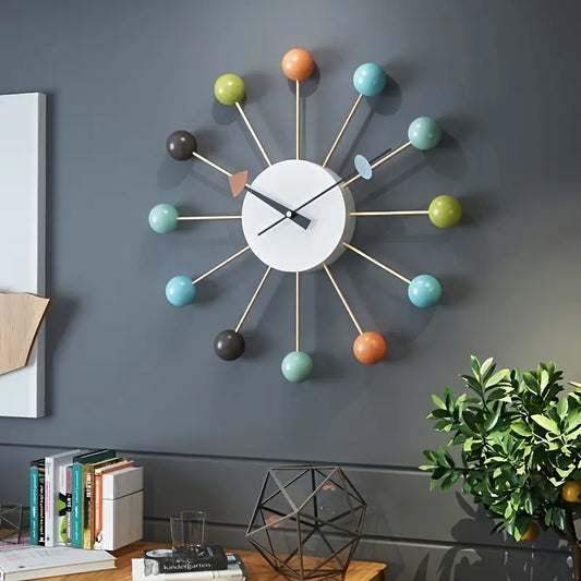Add a Pop of Color to Your Nursery Room with this Creative & Mute Wall Clock!